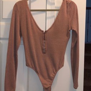 Blush/pink bodysuit from urban outfitters size M